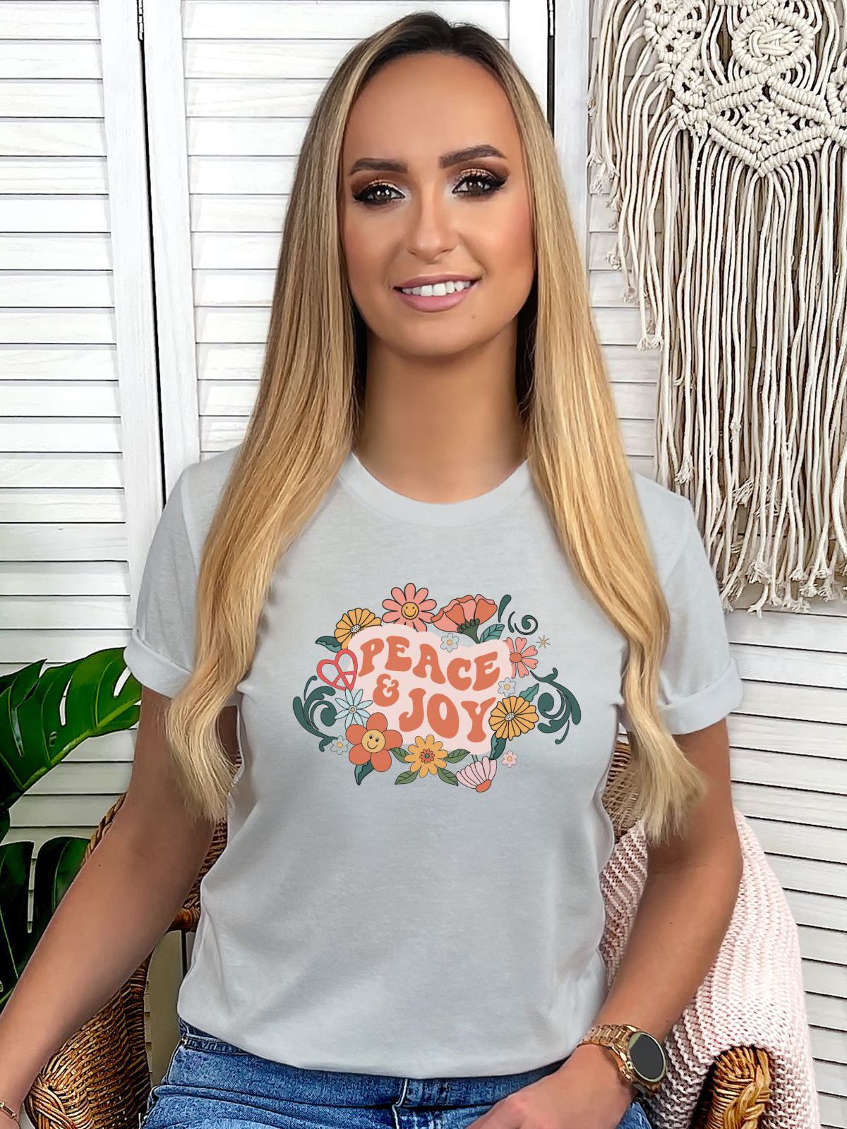 woman wearing Peace and Joy t-shirt
