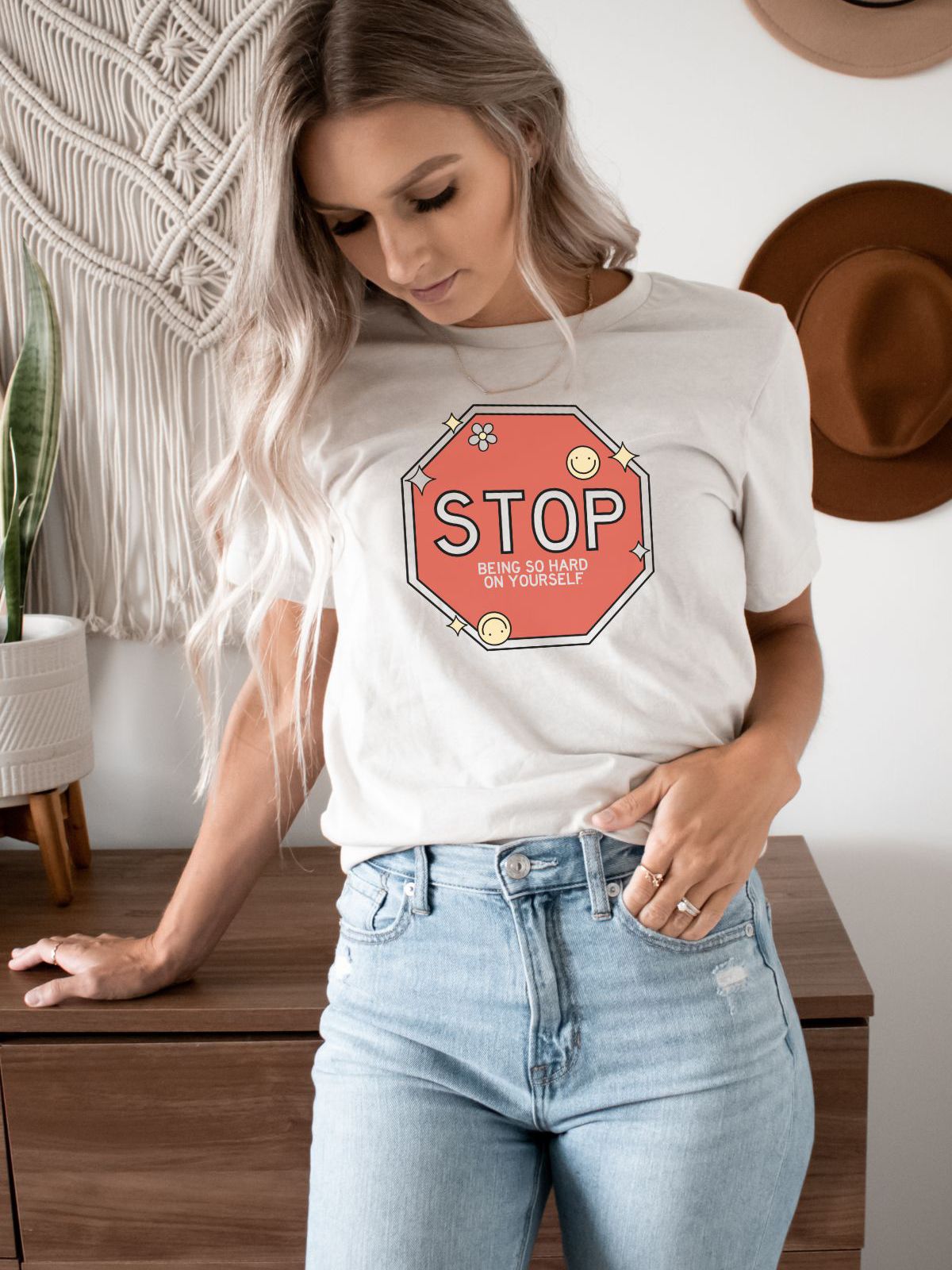 woman wearing stop sign graphic t-shirt