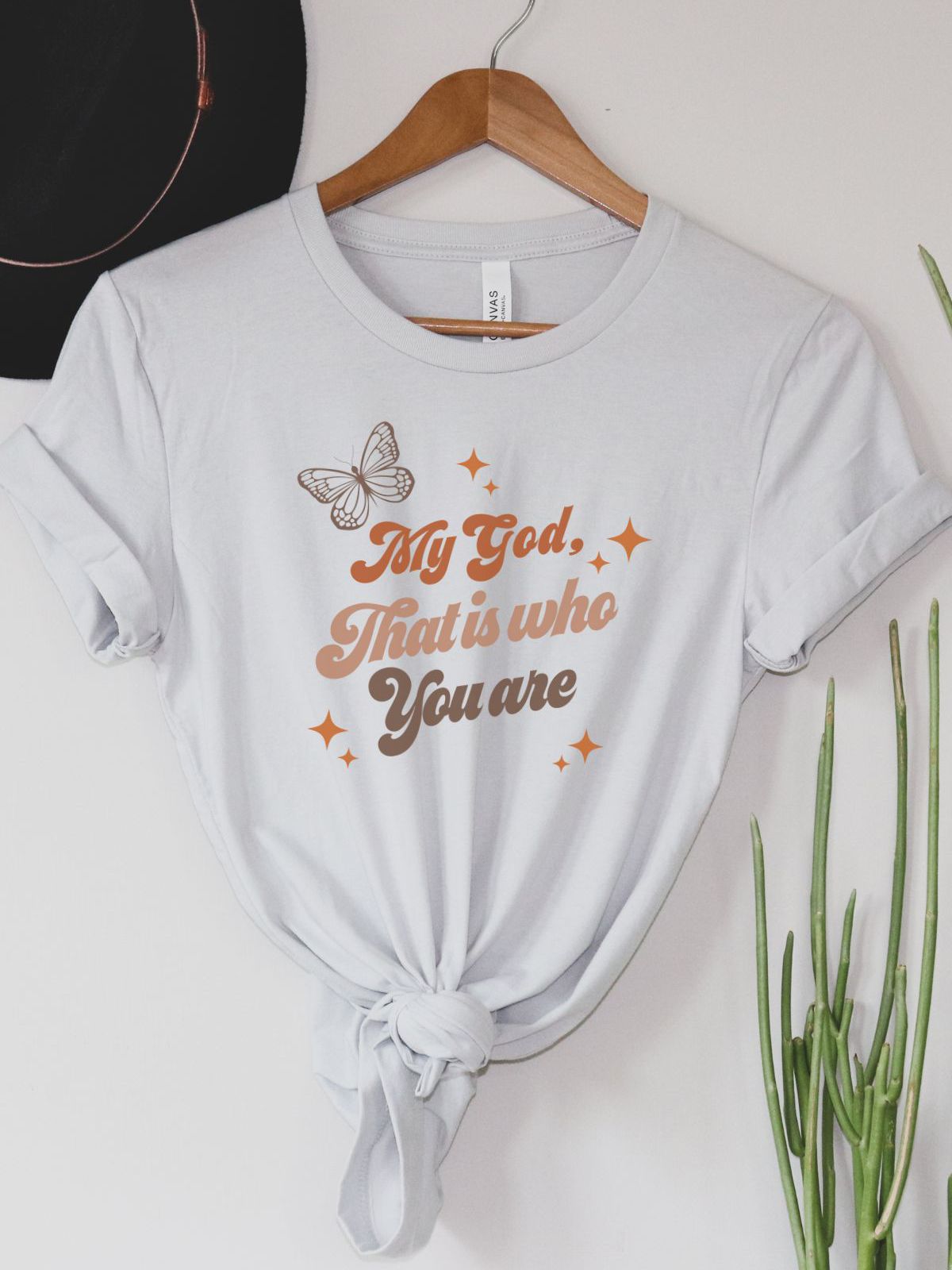 White T-shirt with butterfly and text My God That is who You are