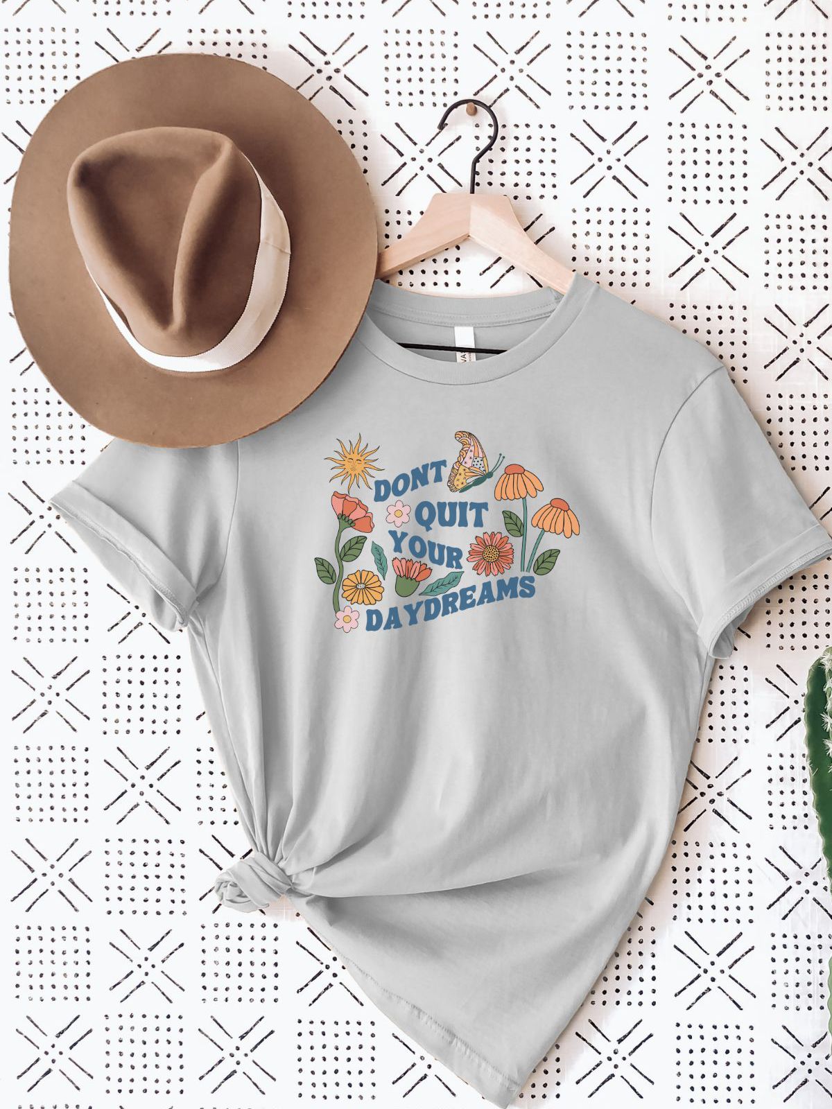 Dont Quit Your Daydreams t-shirt with floral design
