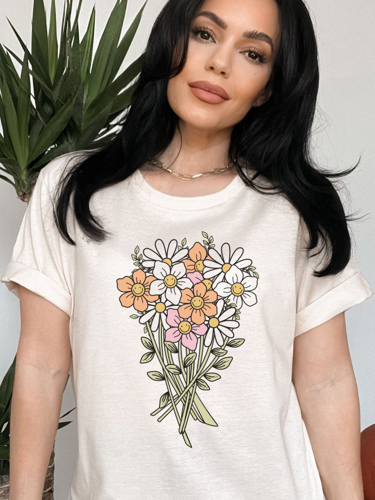 woman wearing a tshirt with floral bouquet design