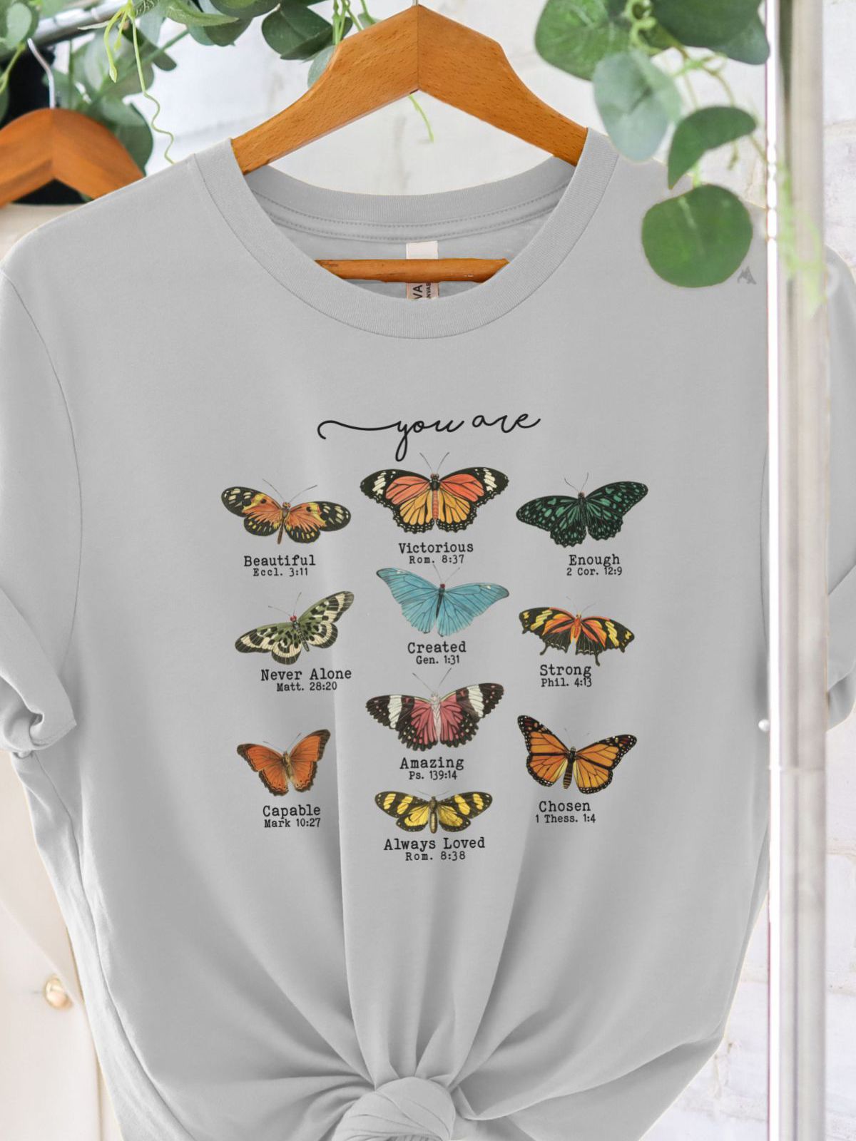 T-Shirt with butterfly design and inspirational text
