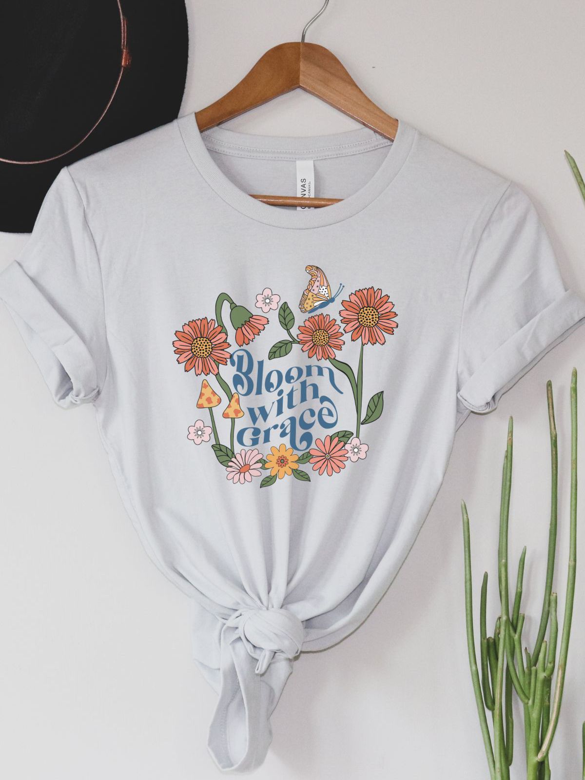 White t-shirt with Bloom with Grace floral design