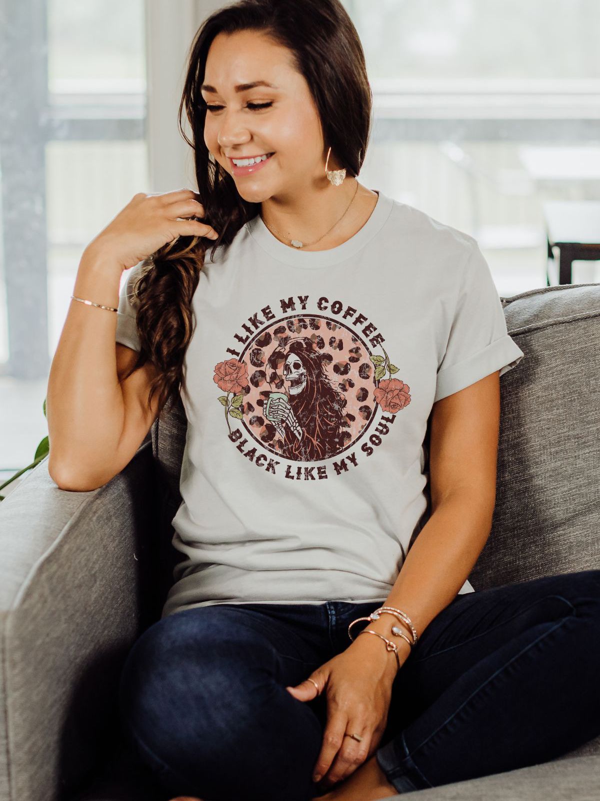 woman wearing skeleton coffee t-shirt