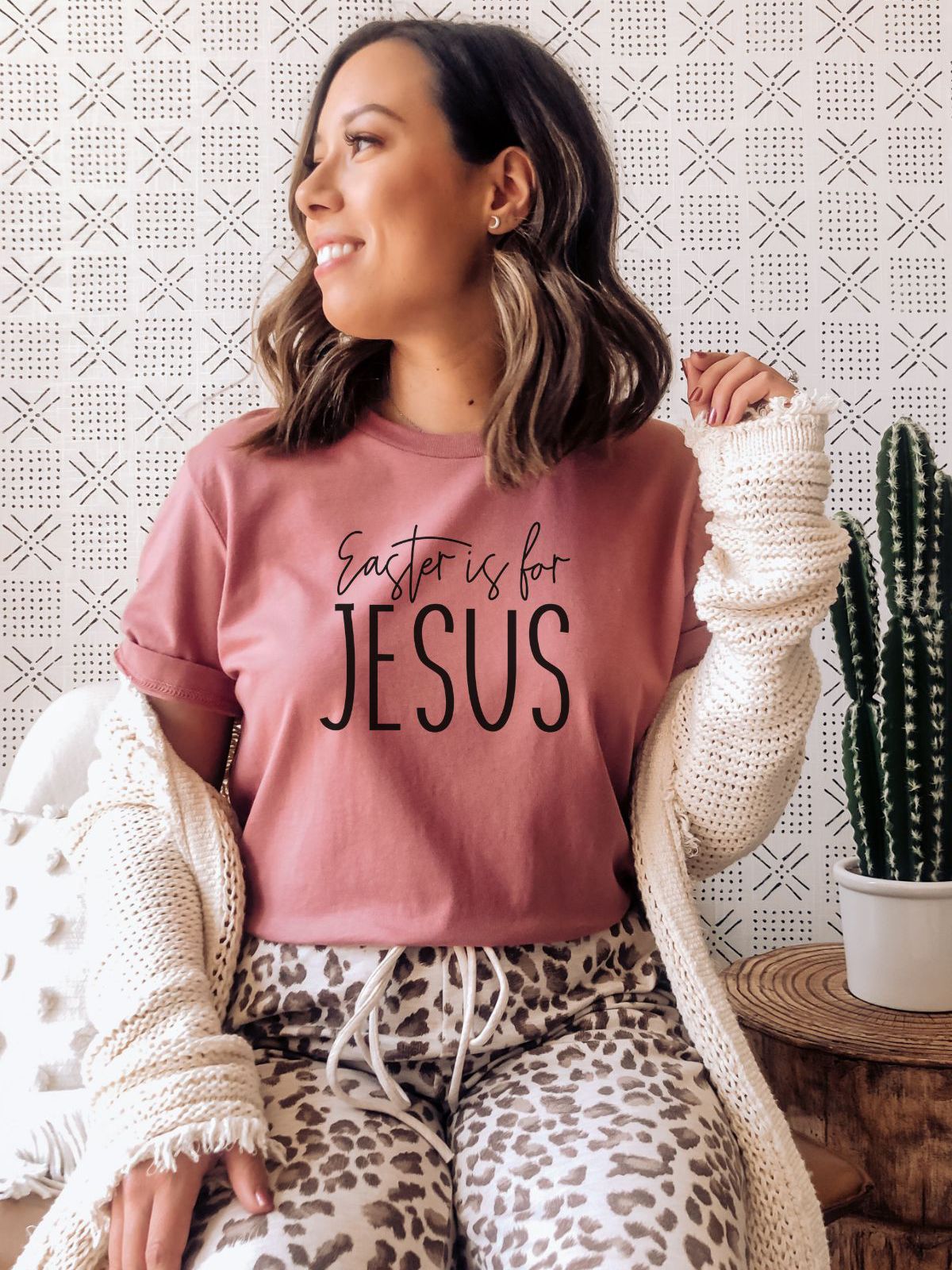 woman wearing pink t-shirt with Easter is for Jesus text