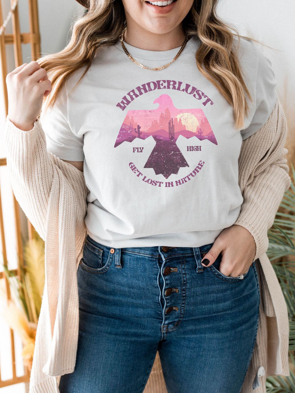 woman wearing wanderlust t-shirt with eagle design