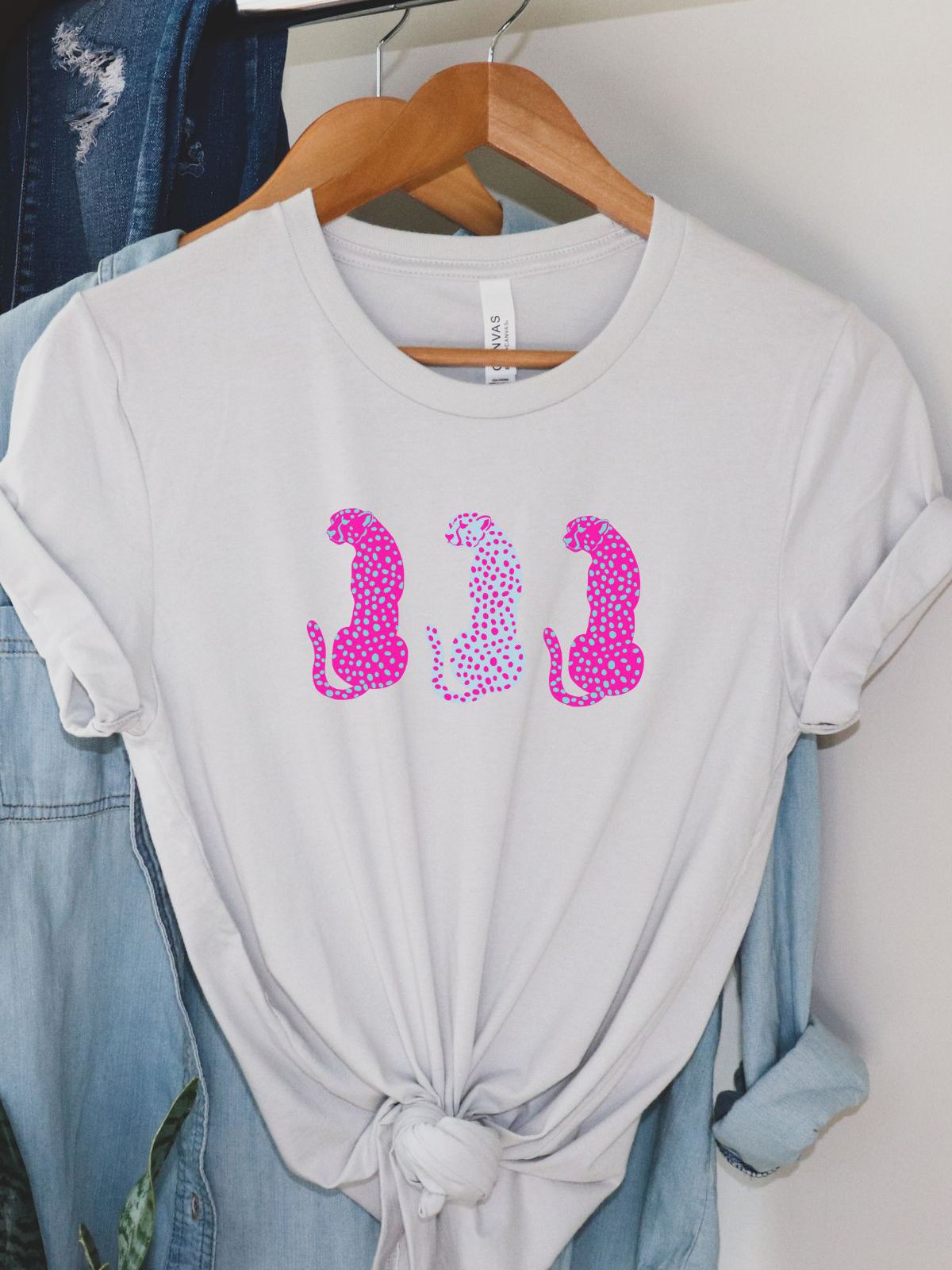 white t-shirt with pink leopard pattern design