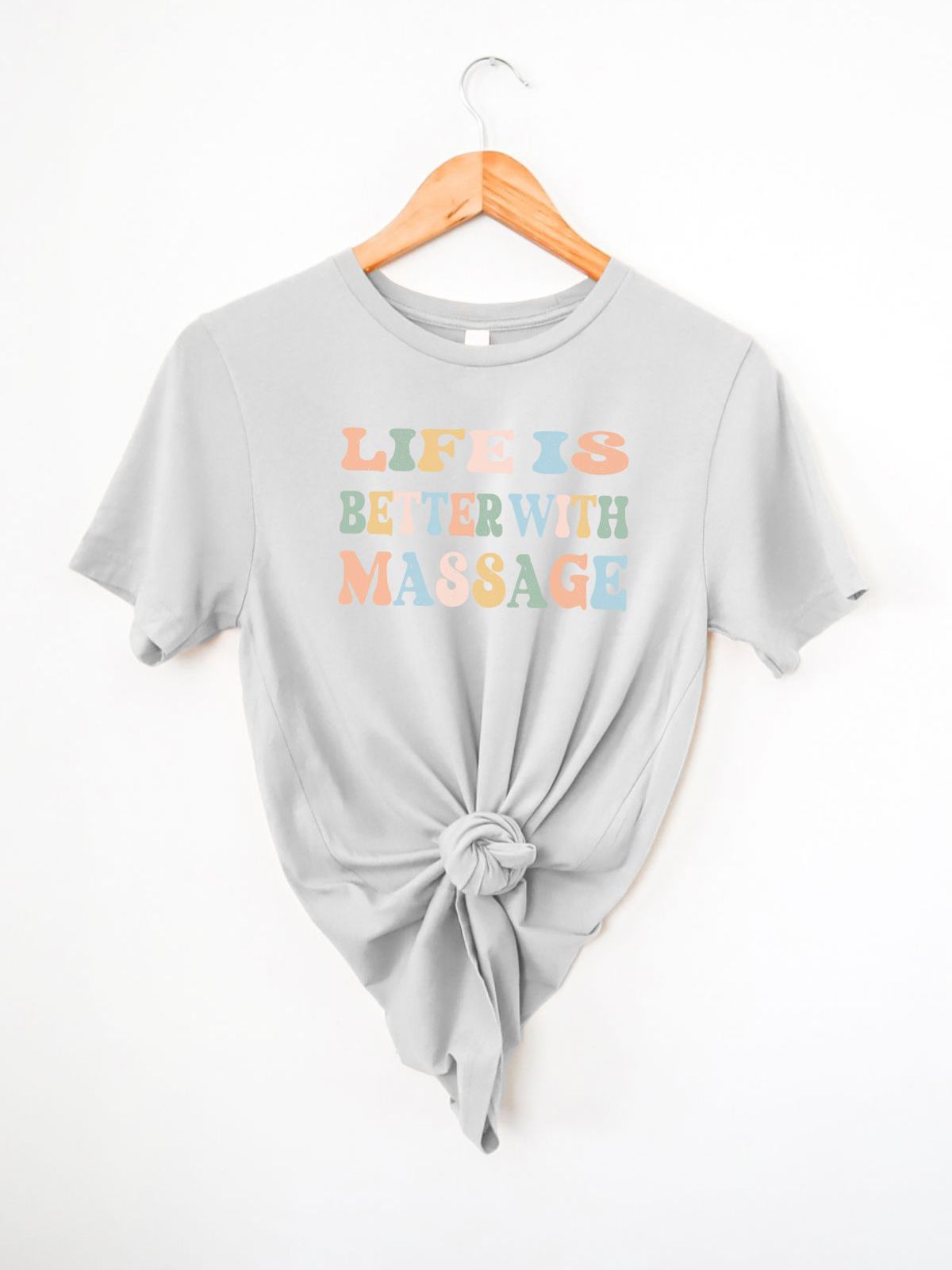 grey t-shirt with life is better with massage text