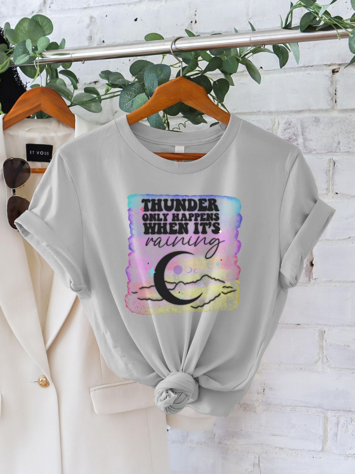 Gray women's t-shirt with thunder quote graphic