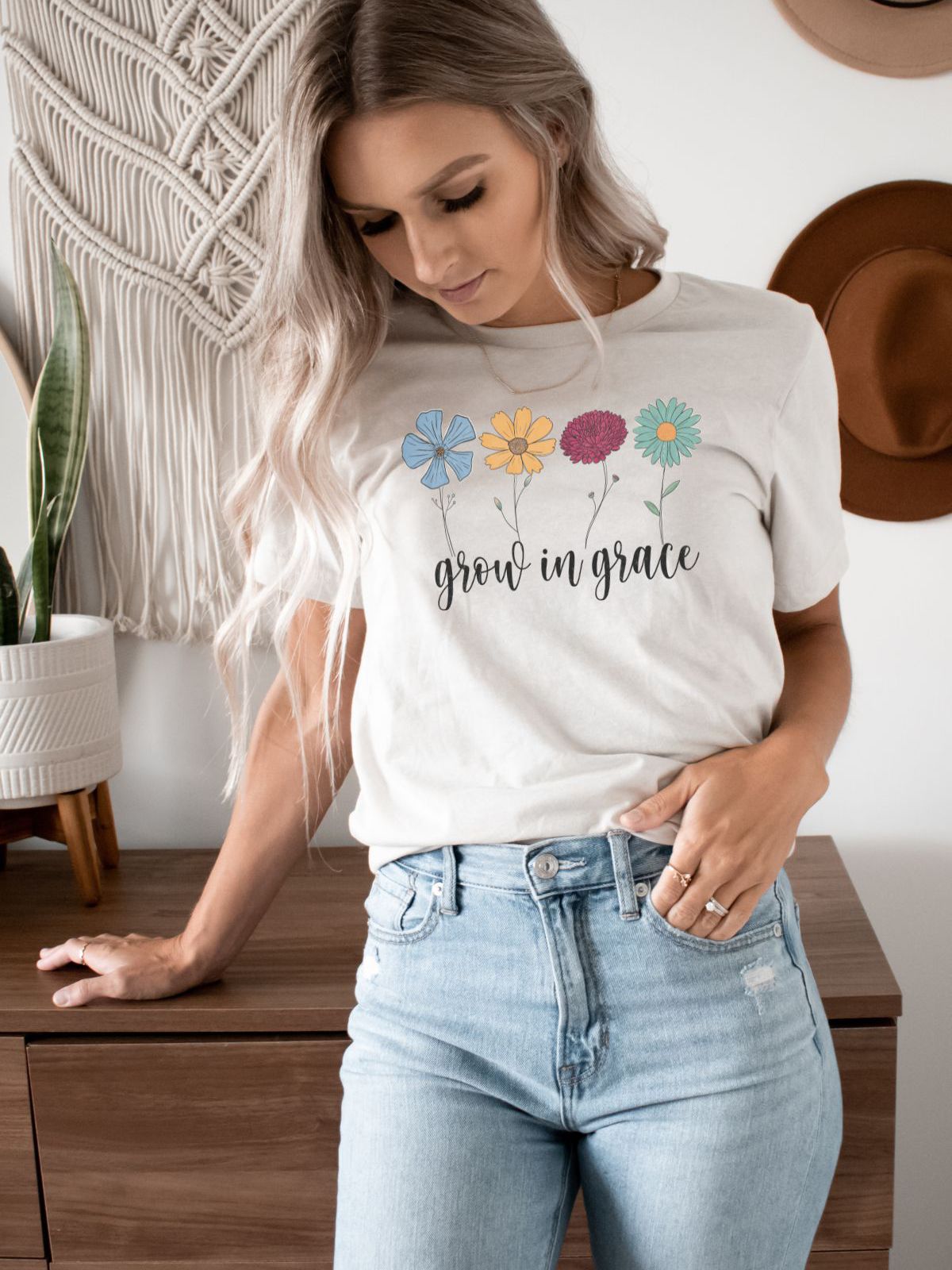 woman wearing grow in grace floral t-shirt