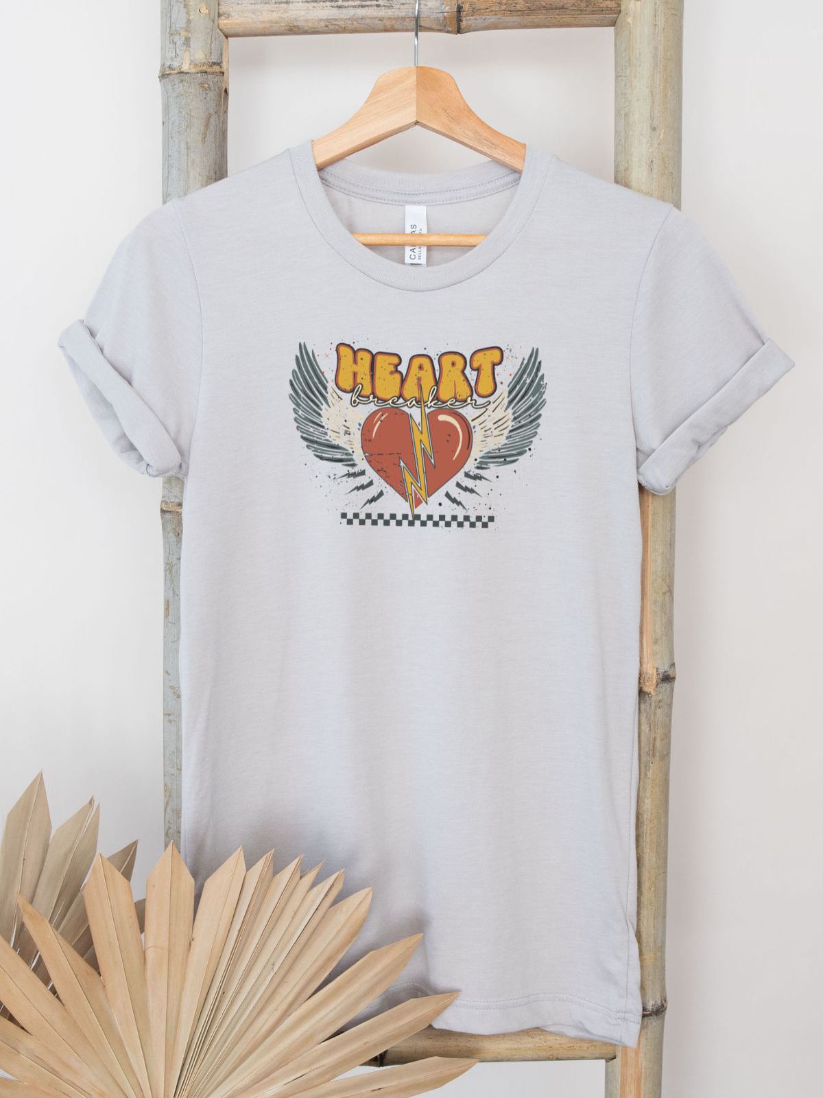 Heartbreaker graphic women's t-shirt with wings design
