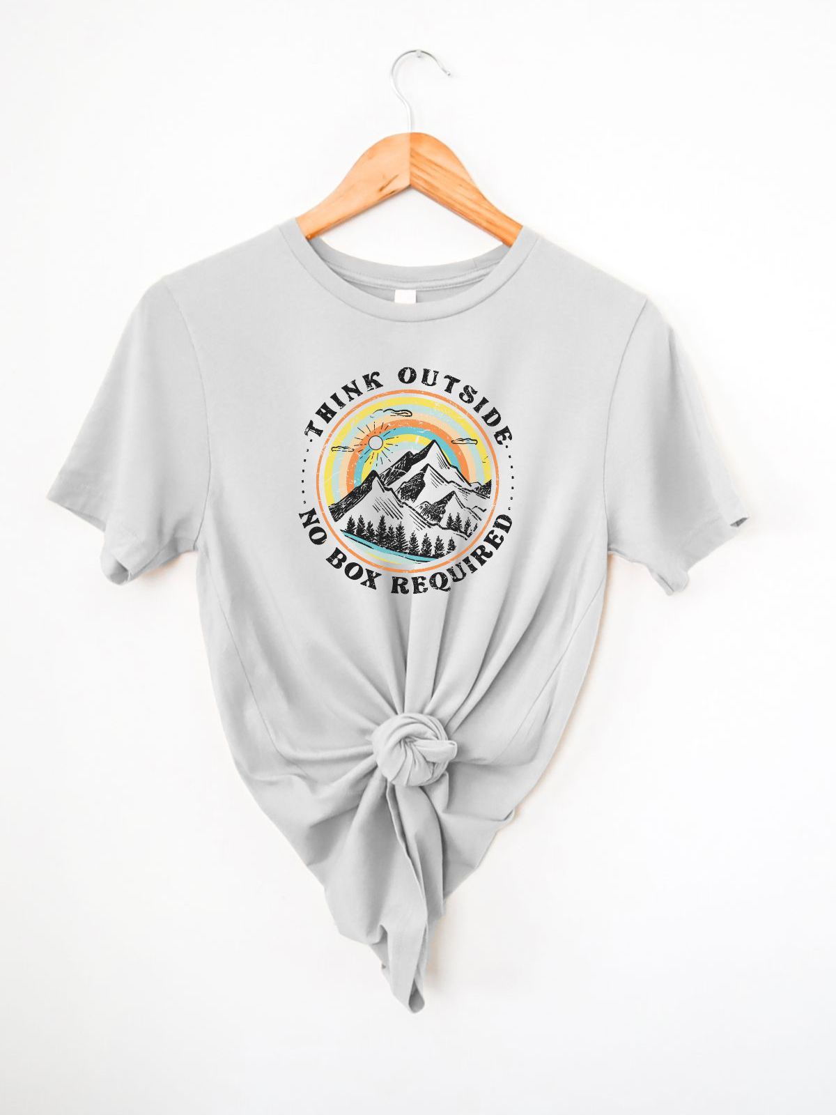 Gray t-shirt with mountain design and text Think Outside No Box Required