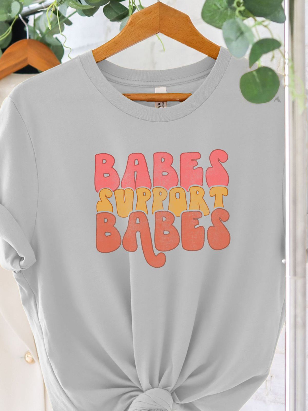 gray t-shirt with Babes Support Babes text