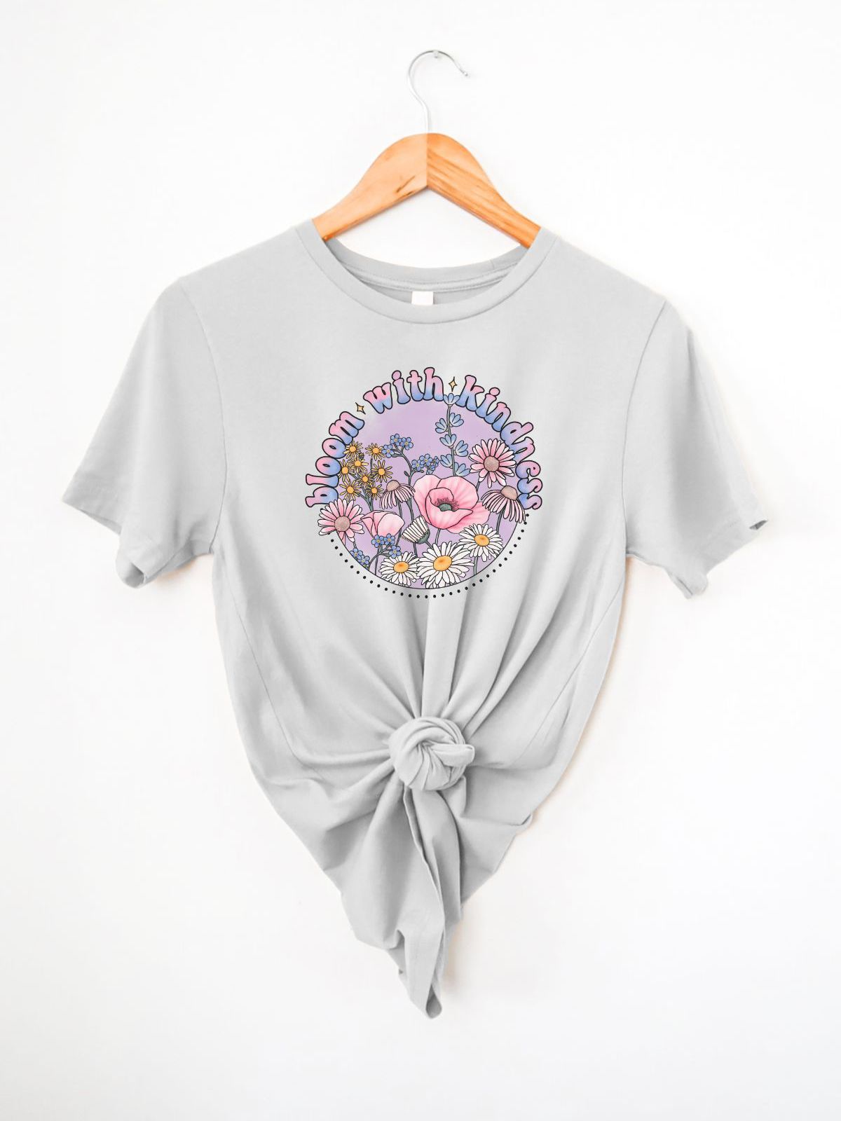 grey t-shirt with bloom with kindness floral design
