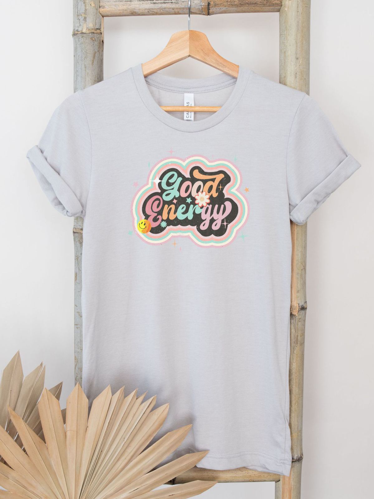 light gray t-shirt with good energy design
