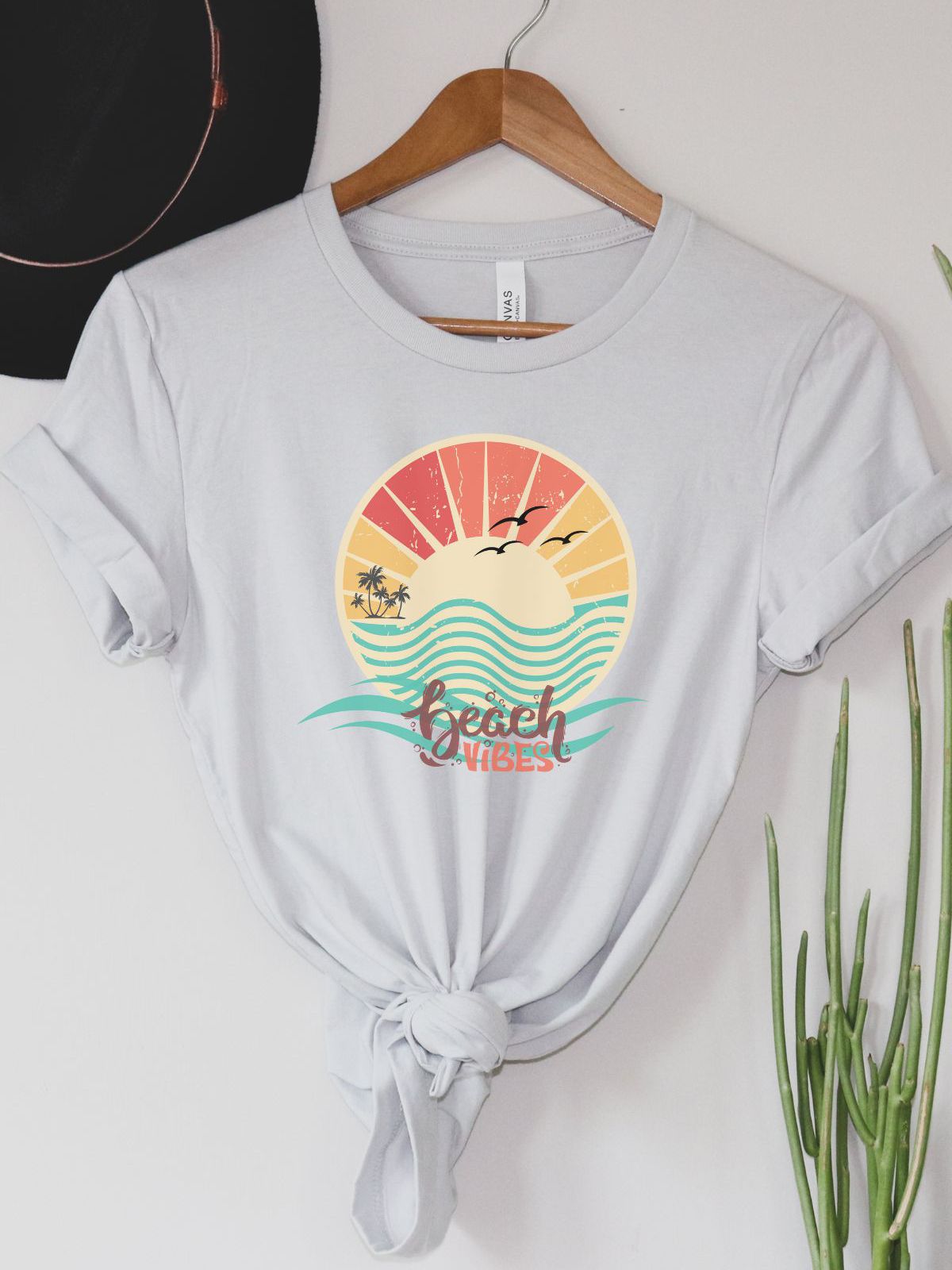 Beach Vibes graphic t-shirt with sunset and waves