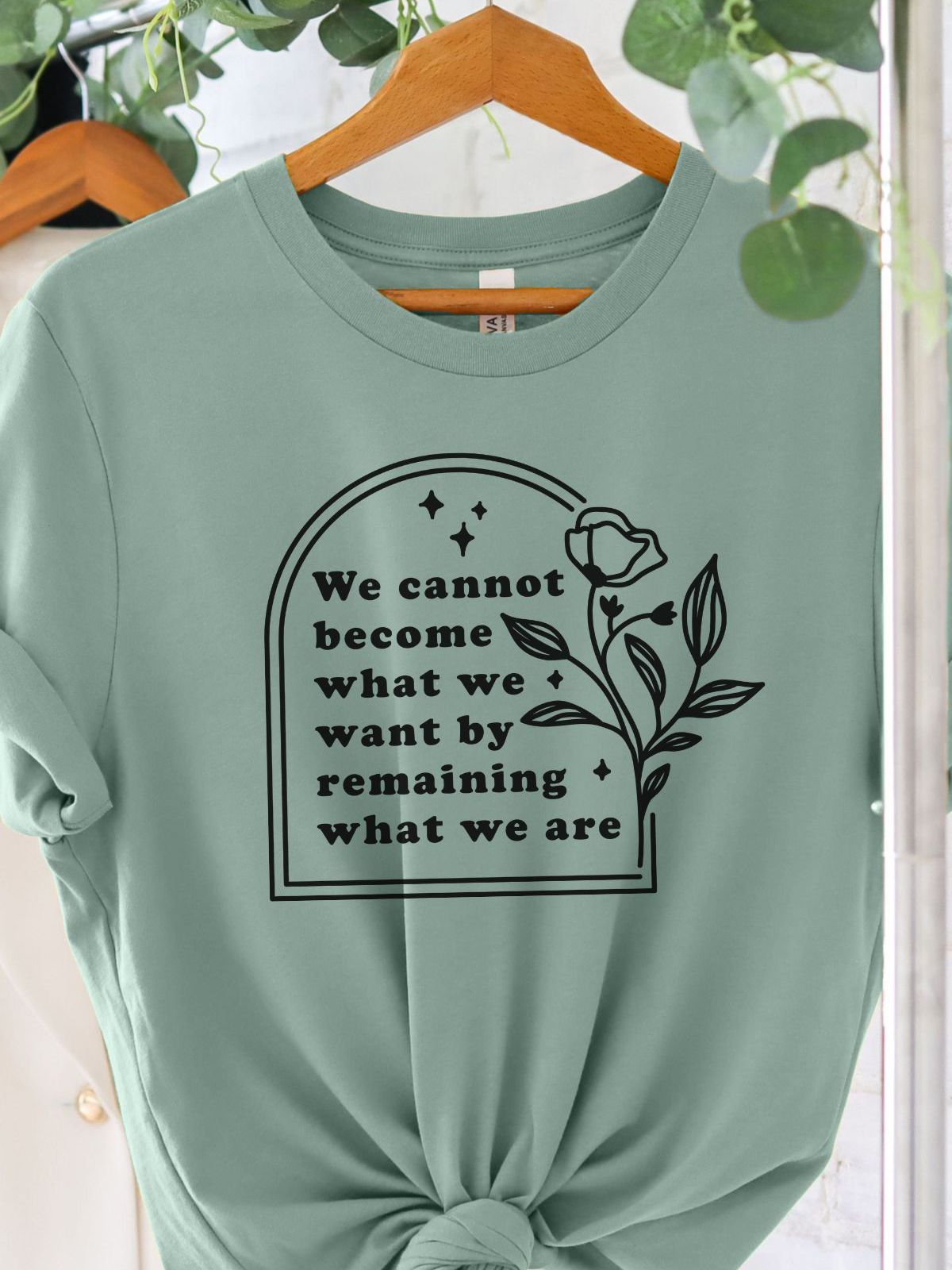 sage green tee with motivational quote and floral design