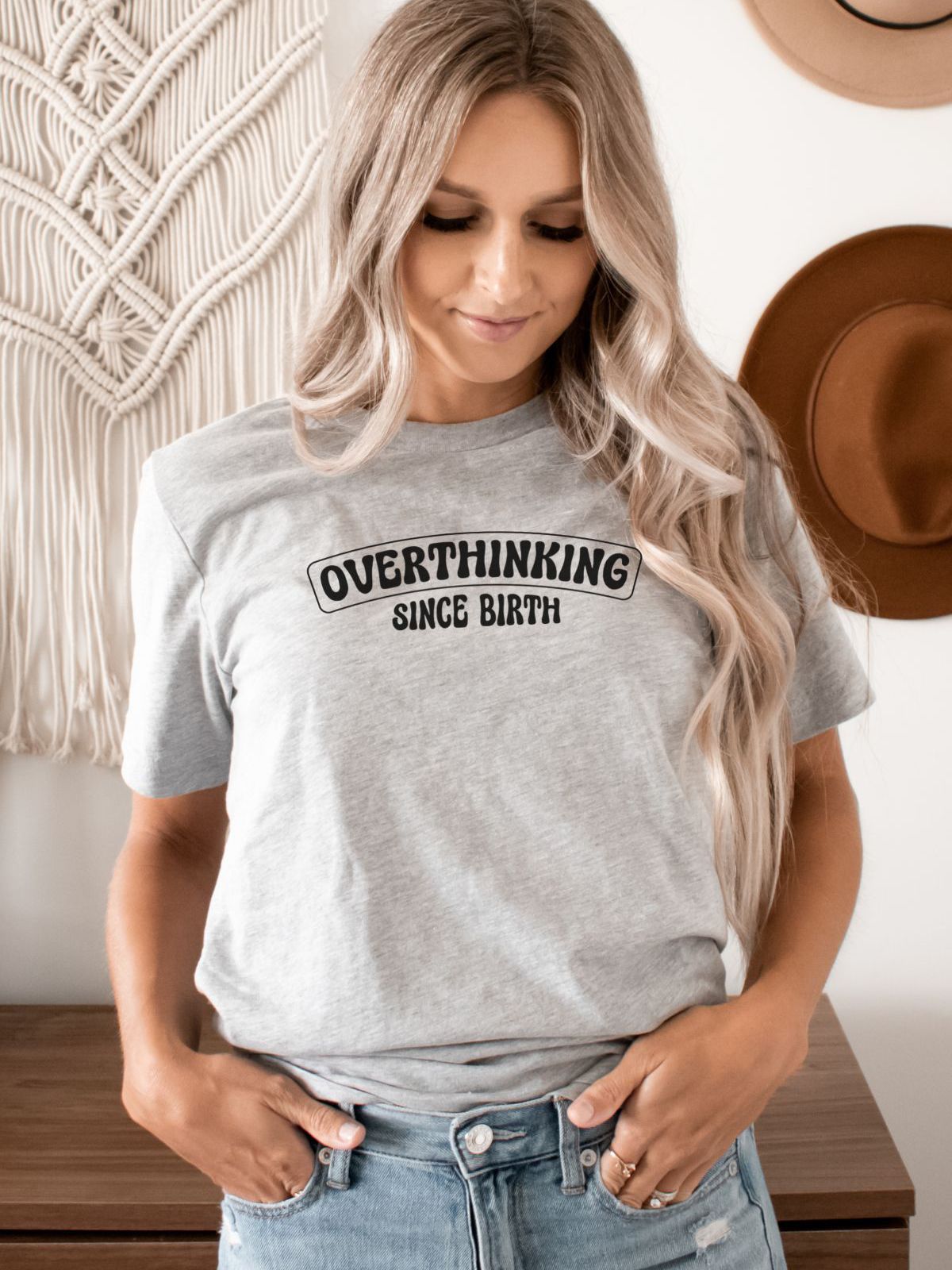 woman wearing overthinking since birth t-shirt