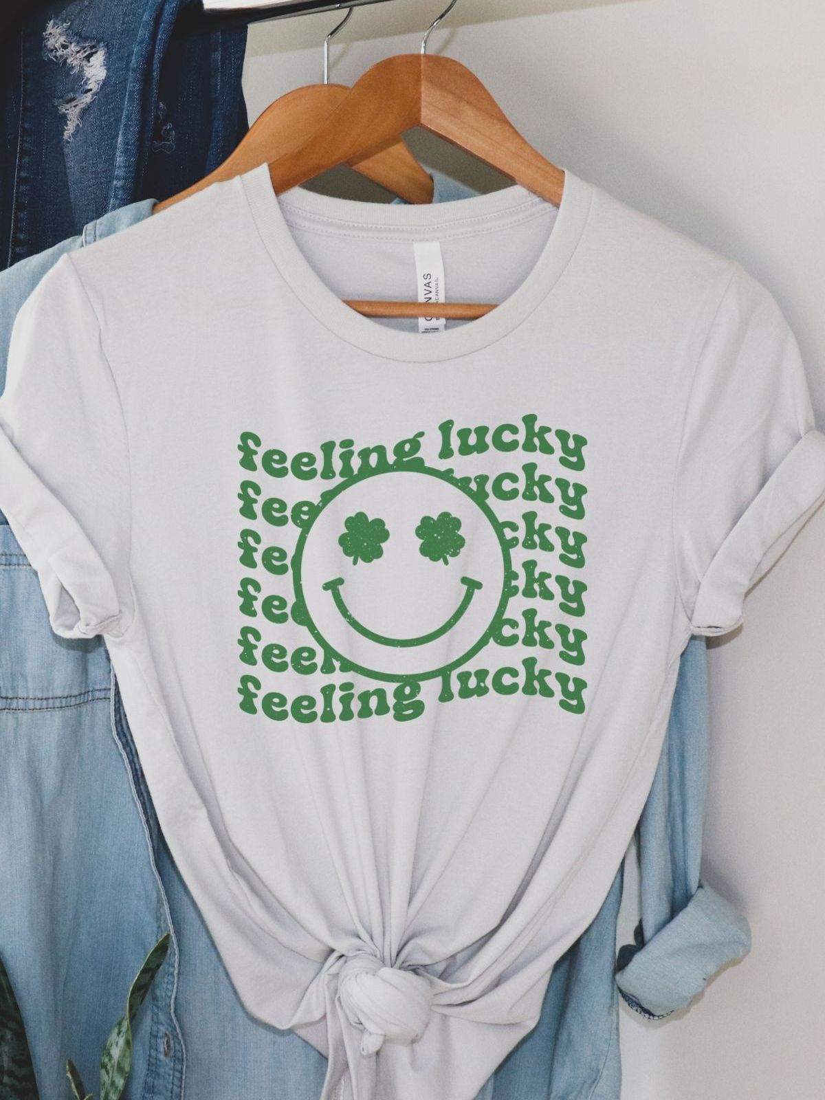 white t-shirt with feeling lucky design