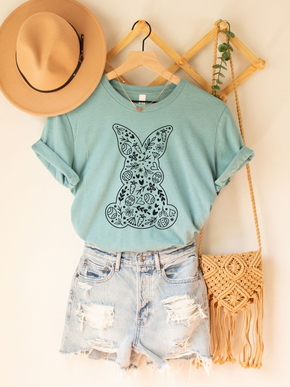 blue t-shirt with floral bunny design
