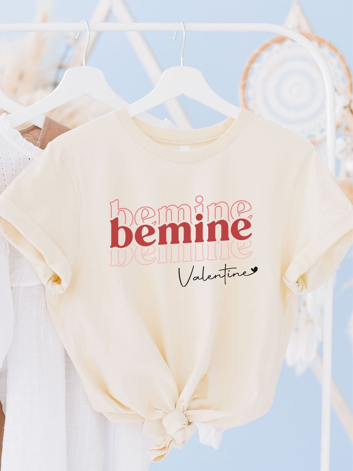 Be Mine Valentine's Day T-shirt hanging on rack