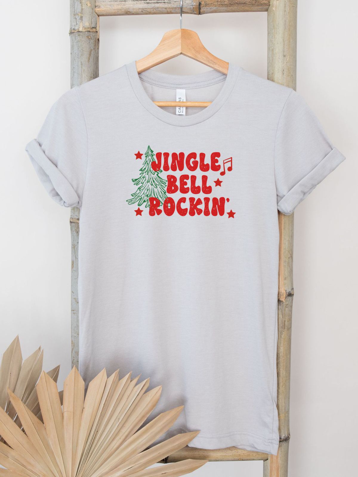 Jingle Bell Rockin Christmas T-Shirt on hanger