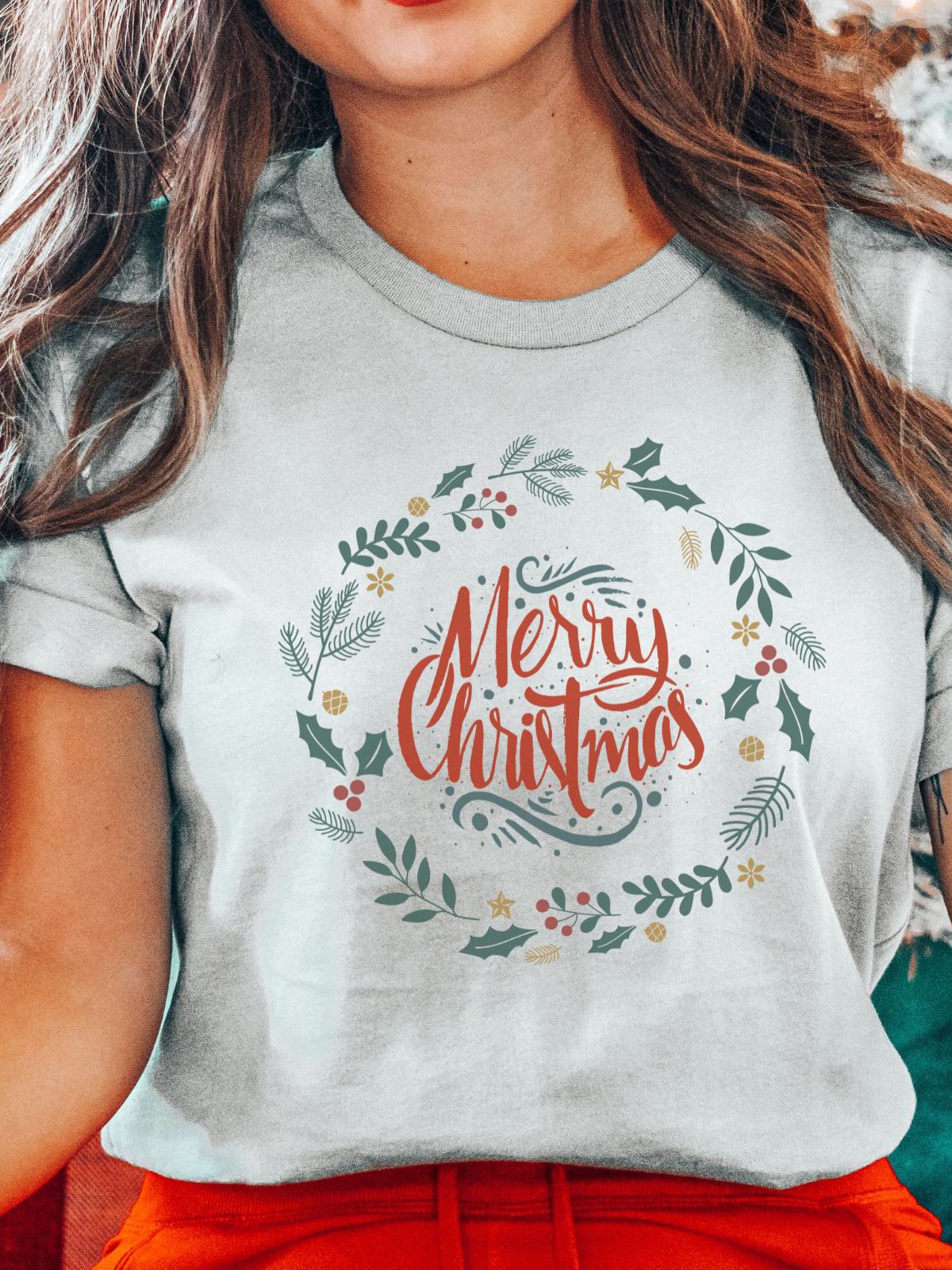Women wearing Merry Christmas themed t-shirt