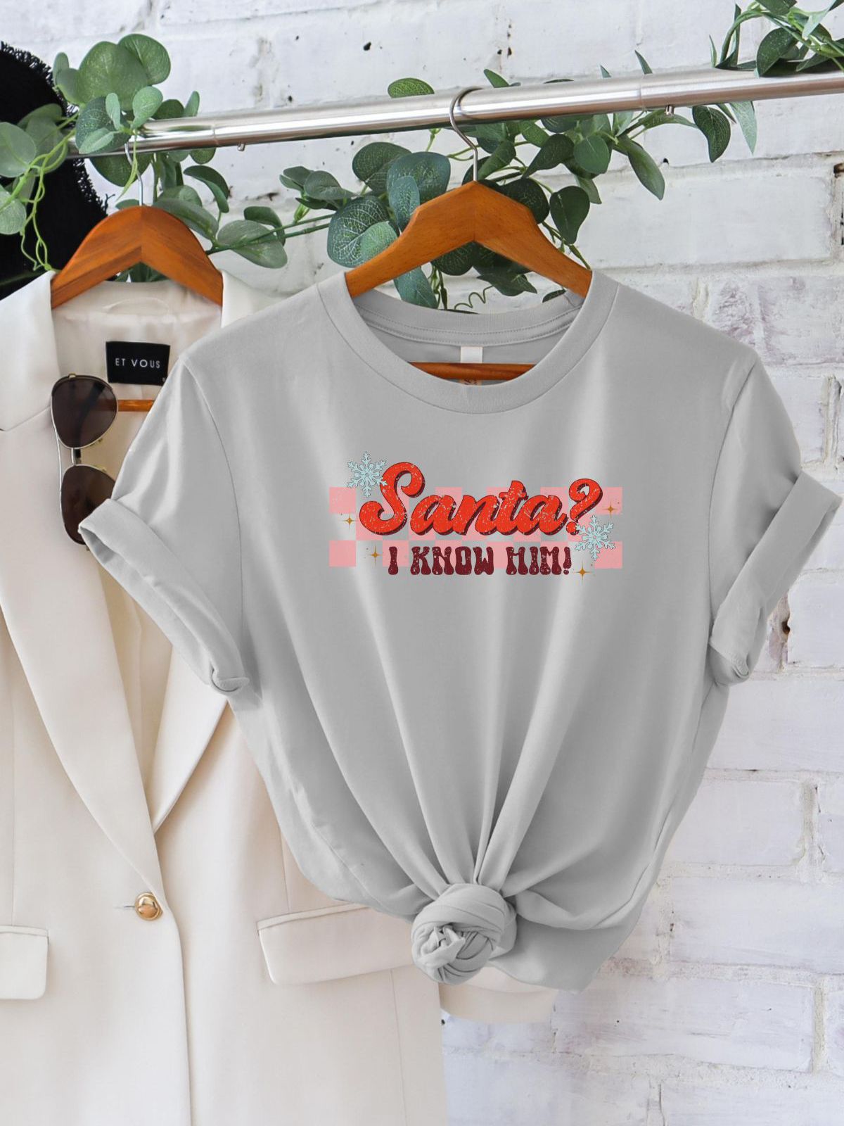 Santa I know him women's Christmas t-shirt hanging