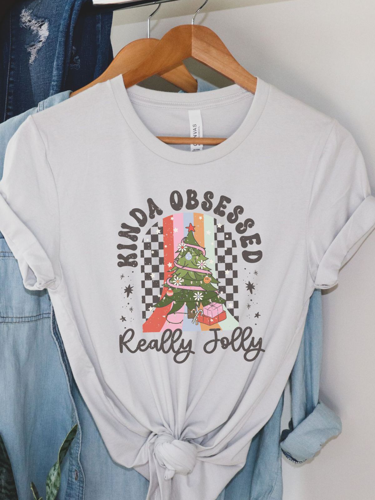 white t-shirt with christmas tree and text design