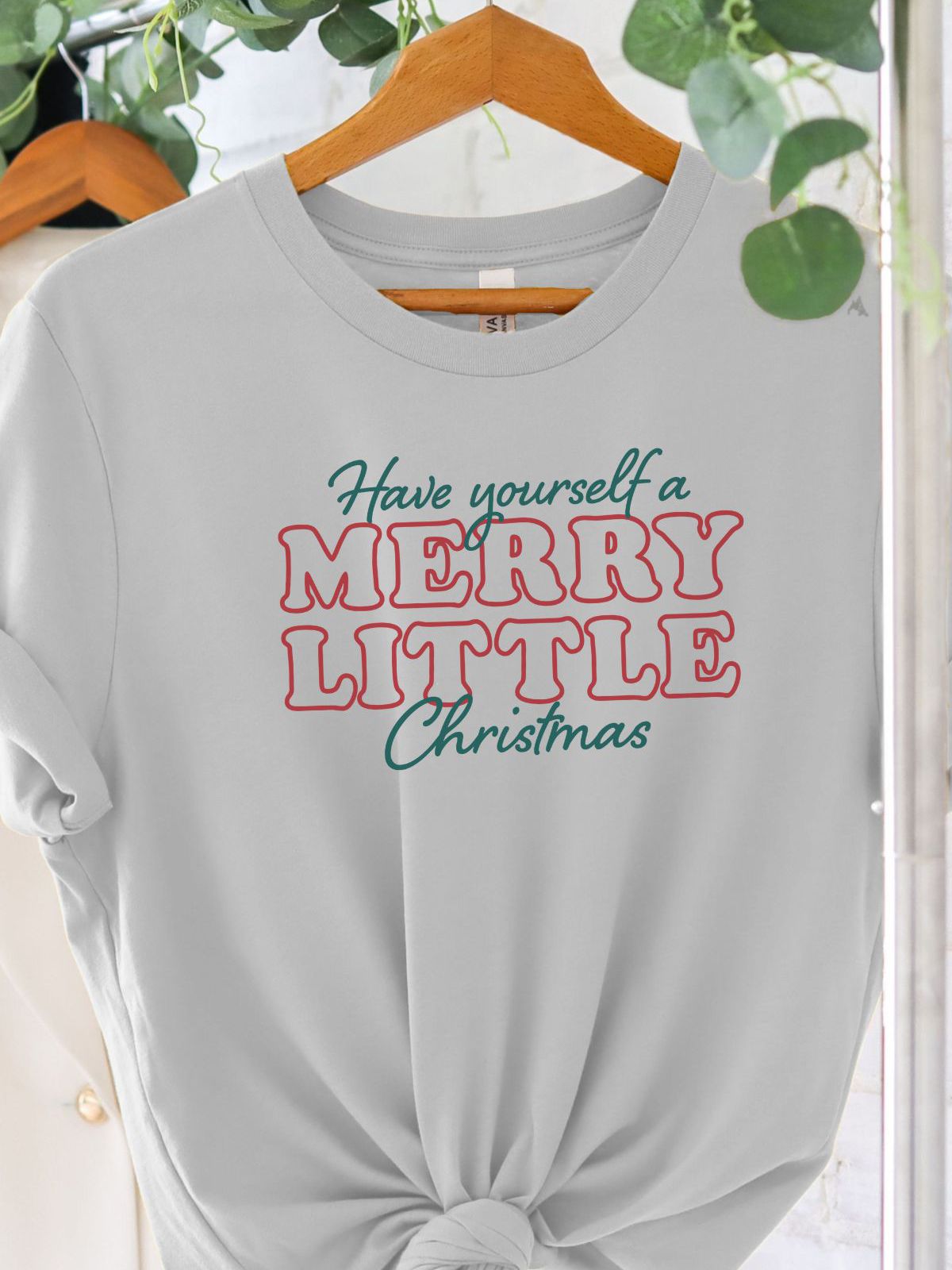 Merry Christmas unisex t-shirt on hanger