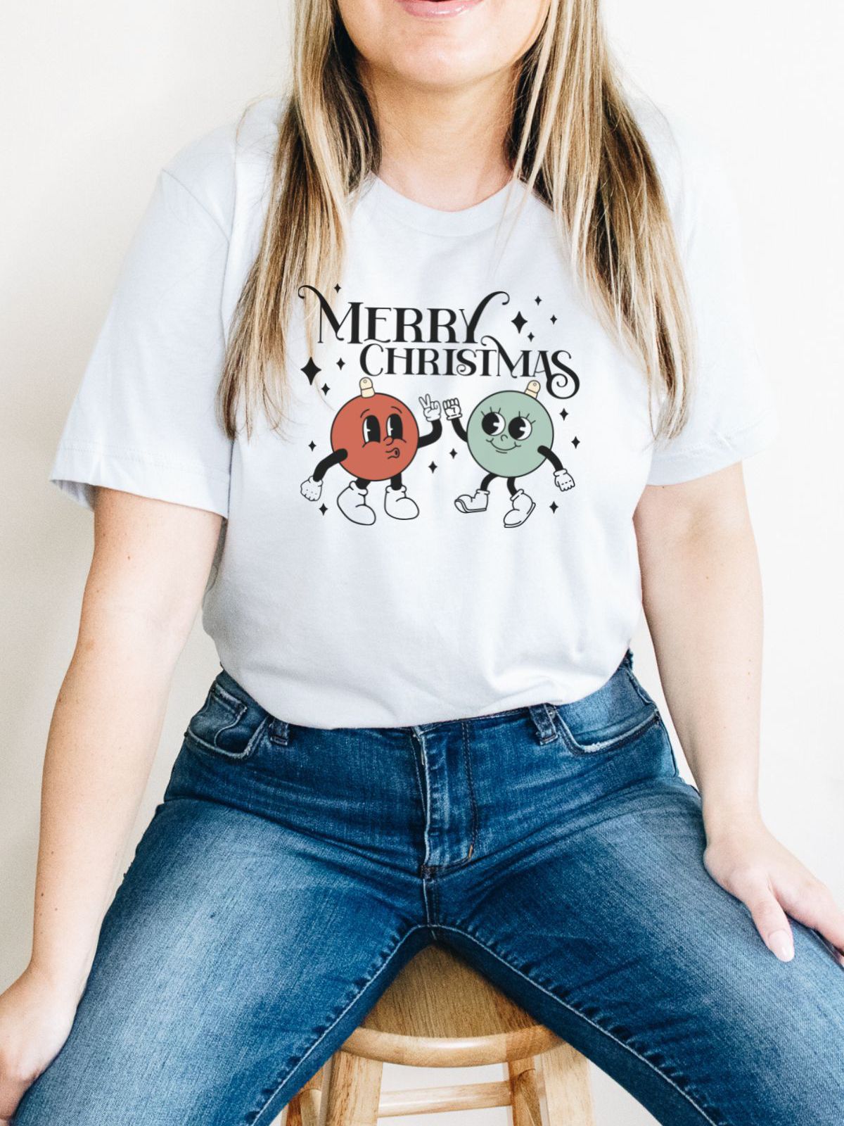 woman wearing Merry Christmas graphic t-shirt