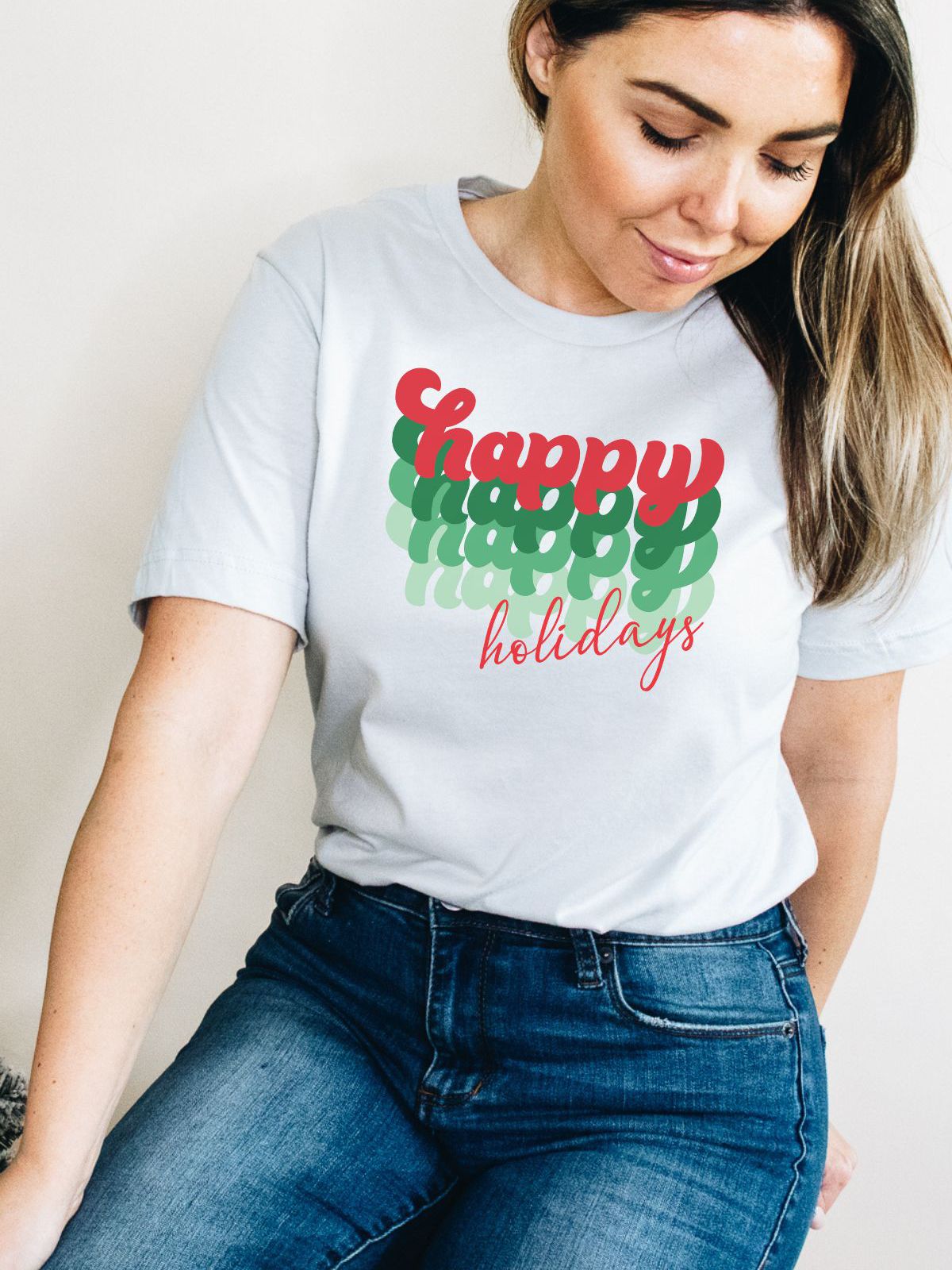 woman wearing happy holidays t-shirt