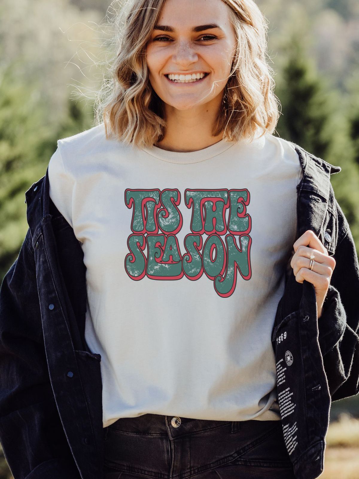 woman wearing 'Tis the Season' shirt