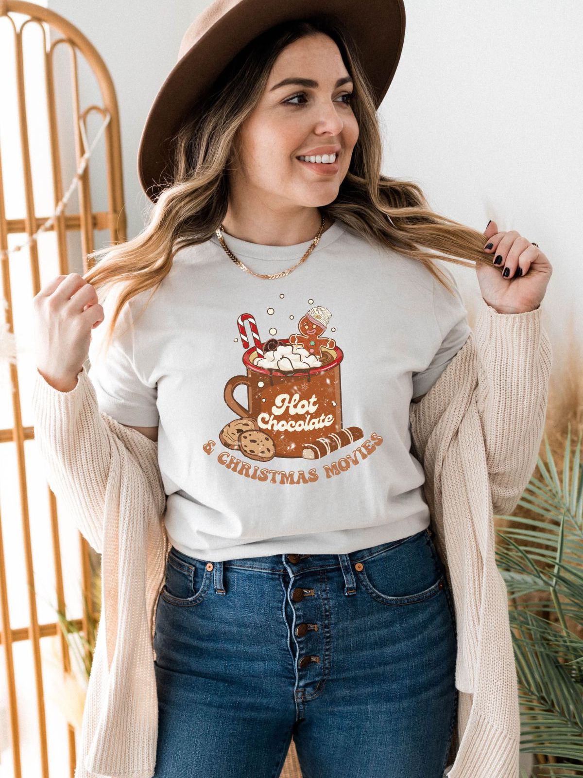 woman wearing hot chocolate and christmas movies shirt