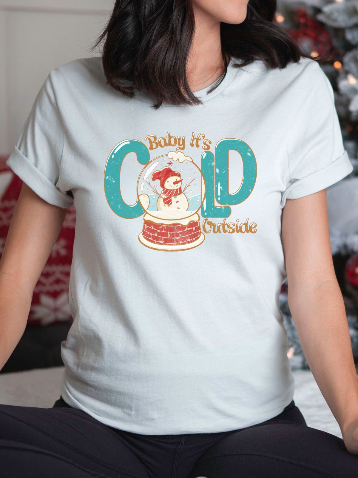 white t-shirt with snowman and Baby It's Cold Outside text
