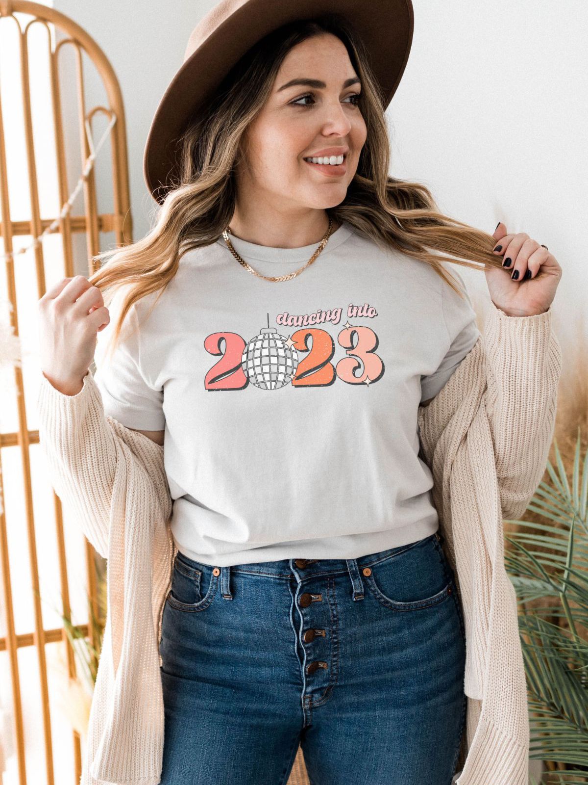 woman wearing Dancing Into 2023 t-shirt