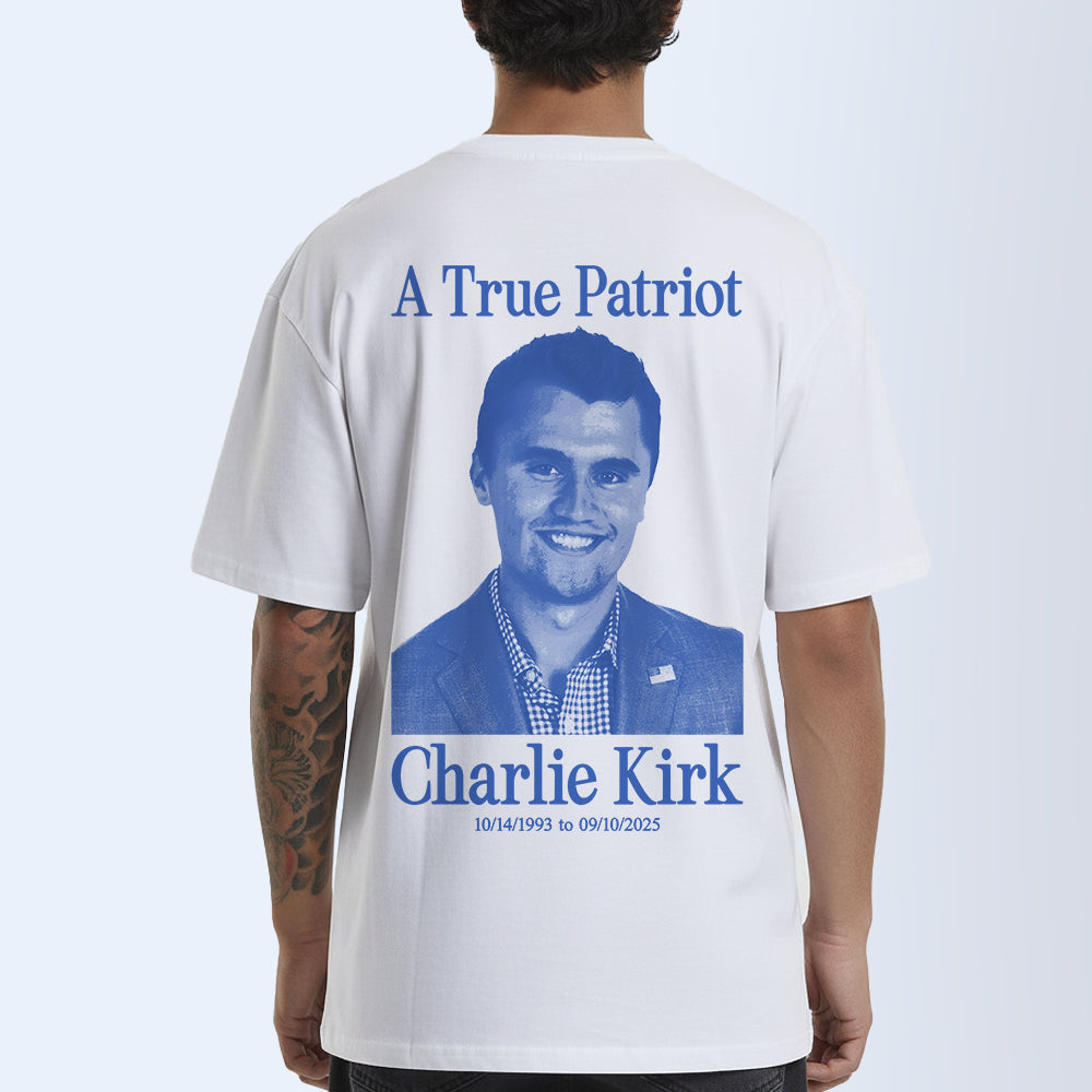 white t-shirt with blue design featuring text and portrait