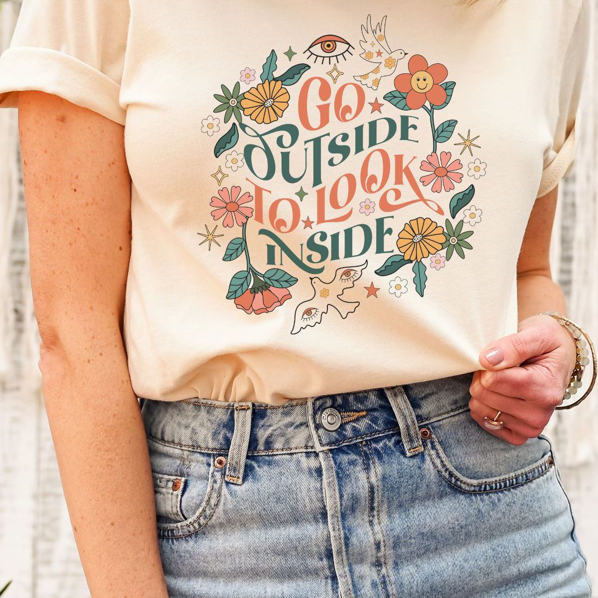 Go Outside Look Inside Women T-Shirt