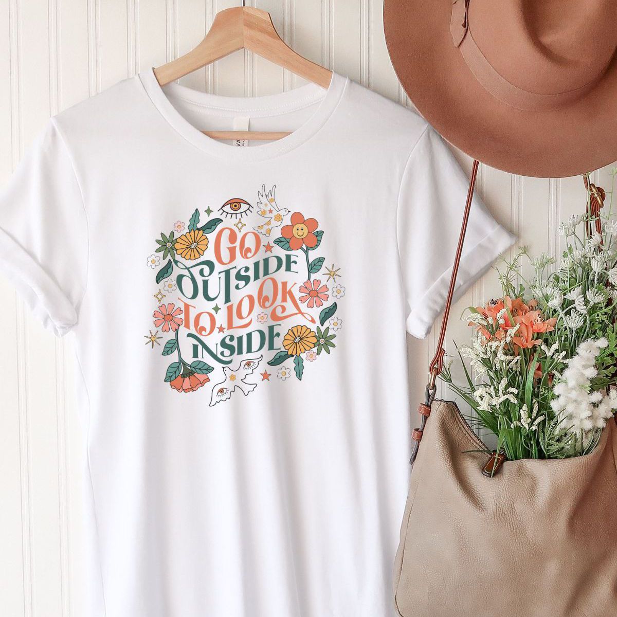 Go Outside Look Inside Women T-Shirt